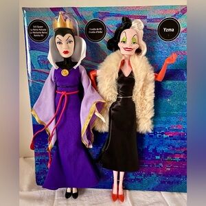 Mattel Disney Villains Evil Queen, Cruella de Vil Fashion Dolls, 2-Pack